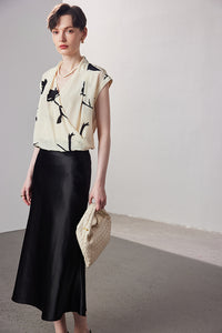 Sleeveless printed V-neck silk blouse